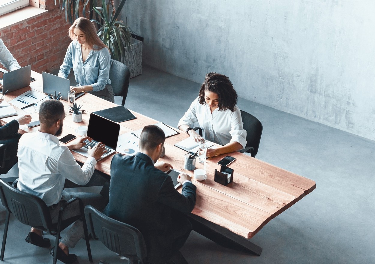 Team reviewing connected business records and decisions together